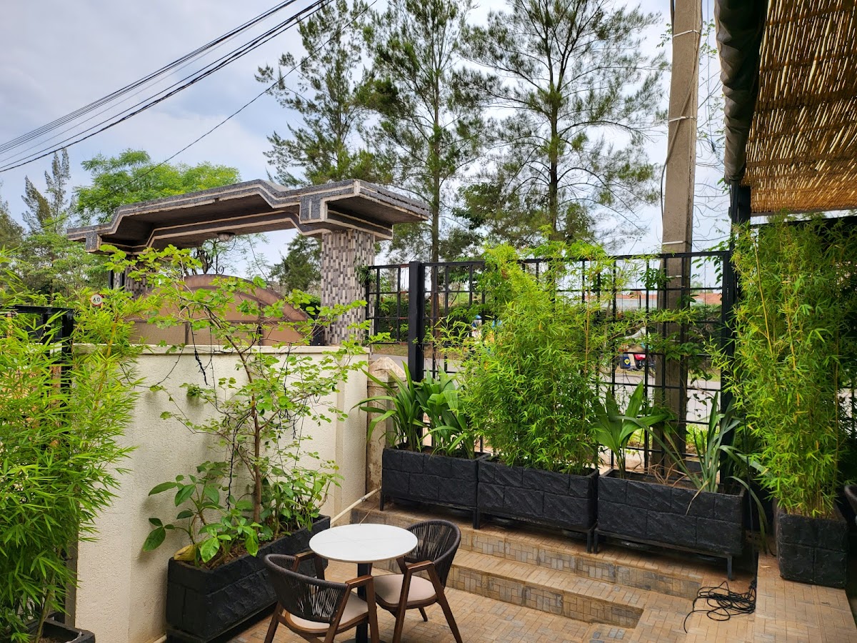 Mukati na Butta Cafe — the small-café register that matches the slower-paced southern Rwanda circuit